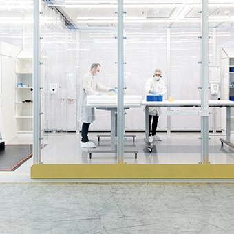 Scientists in a sterile room
