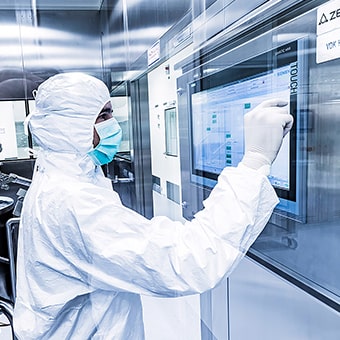 Scientist in a protective suit